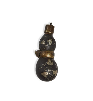 A Japanese Double-gourd Shaped Iron Netsuke