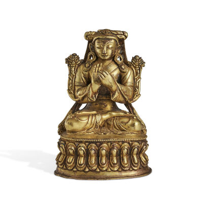 A Tibetan Gilt Bronze Lama