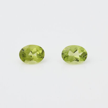 One Pair of Matched Oval Cut Peridots. TW 2.85ct