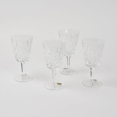 A Set Of Four Waterford Crystal Wine Glasses