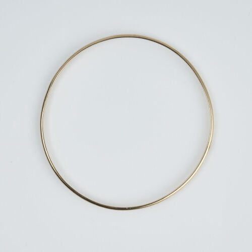 A Fine 9ct Gold Bangle