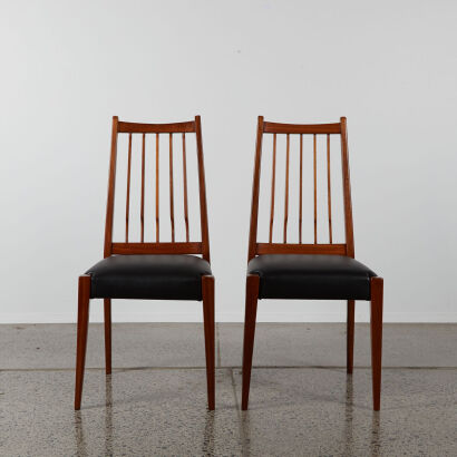 A Pair Of Mahogany Jon Jansen Knifeblade Dining Chairs