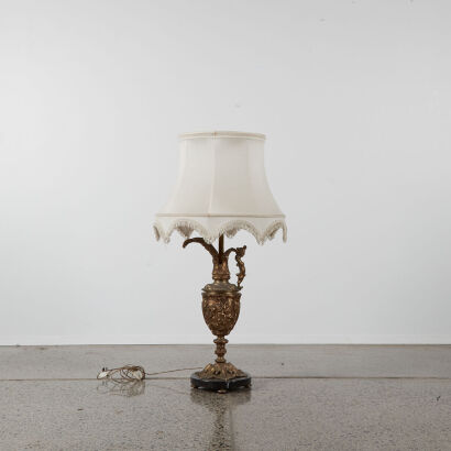 A Large Italian Brass Lamp With A Marble Base