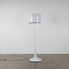 A Floor Standing Lamp With a Pedestal Base