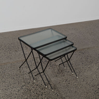 A Trio Of Retro Glass And Steel Nesting Tables