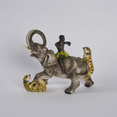 A 1950s Blackamoor Mahout Warrior Elephant Tiger Statue