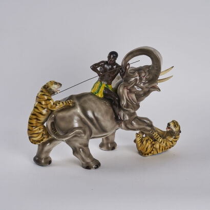 A Large 1950s Blackamoor Mahout Warrior Elephant Tiger Statue