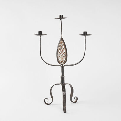 A Beaten Steal Candelabra With A Wooden Inlay