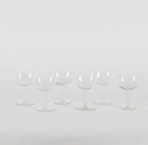 A Set Of Six Vintage Etched Glass Hollow Stem Champagne Glasses