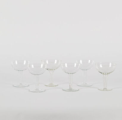 A Set Of Six Vintage Etched Glass Hollow Stem Champagne Glasses