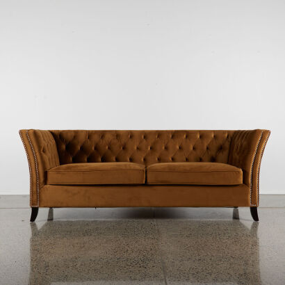 A Velvet Copper Studded Couch