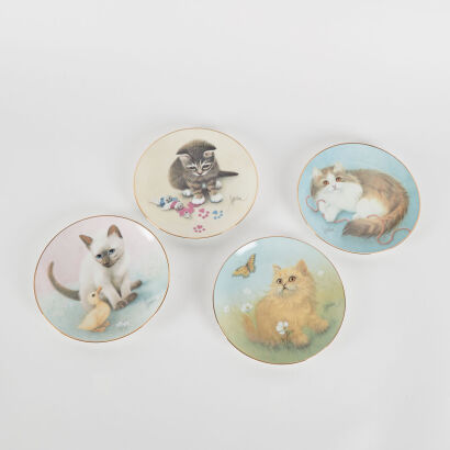 A Set of Four Bob Harrison Curious Kitten Plates