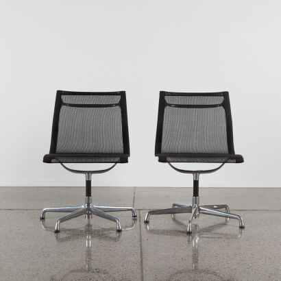 A Pair Of Herman Miller Style Mesh Swivel Chairs