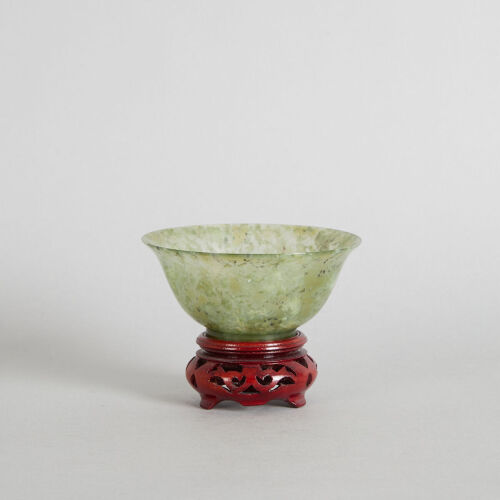 A Chinese Green Jade Carved Bowl and Wood Stand