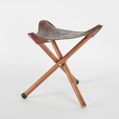 A Leather Craft And Wooden Collapsable Tripod Stool