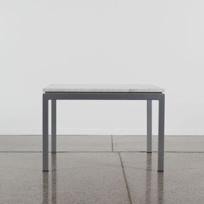 A Marble Topped Coffee Table With Stainless Legs By Bromhead Design