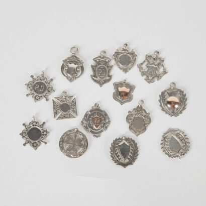 A Collection Of Vintage Silver Pendants