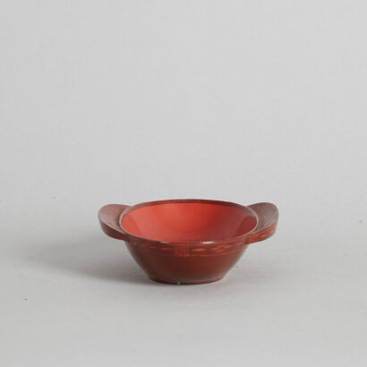 A Chinese Red Lacquered Two-Handled Saucer