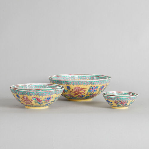 A Set of Chinese Yellow-Ground Famille Rose 'Dragon' Bowls