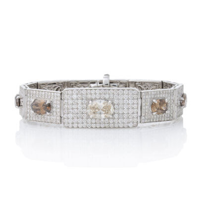 An Impressive 18ct White Gold, Champagne & White Diamond Bracelet of 18.68cts