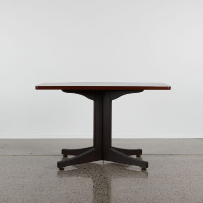 A Solid Mahogany Table On Black Pedestal Base