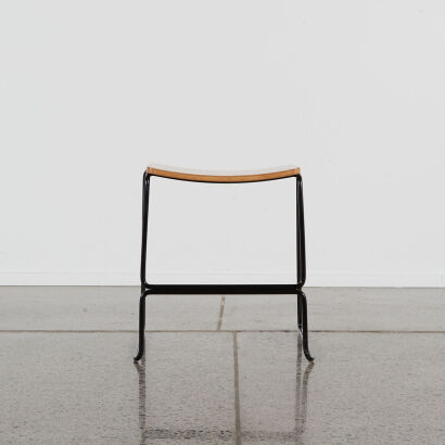 A Contemporary Plywood Topped Stool With Black Metal Frame