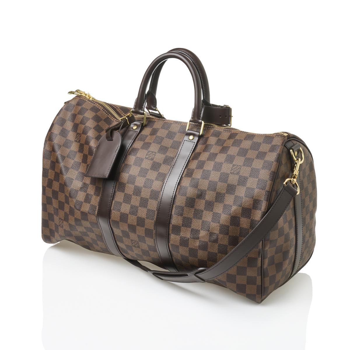At Auction: Louis Vuitton, LOUIS VUITTON DAMIER EBENE KEEPALL BANDOULIERE  BAG