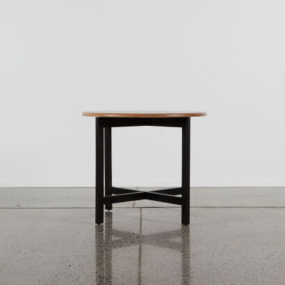 A Round Side Table in Blonde Oak With Black Base