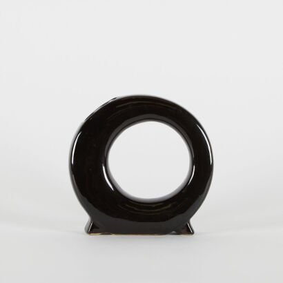 A Black Circular Ceramic Bud Vase