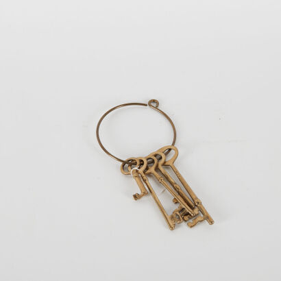 A Five Ring Of Brass Skeleton Keys