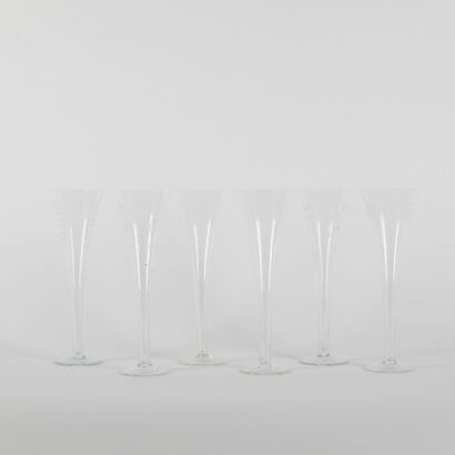 A Set Of Six Vintage Etched Glass Champagne Flutes