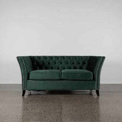 A Green Velour Button Back Couch