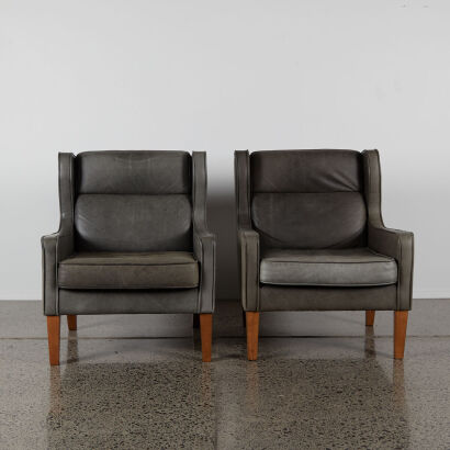 A Pair Of Contemporary Grey Leather Armchairs