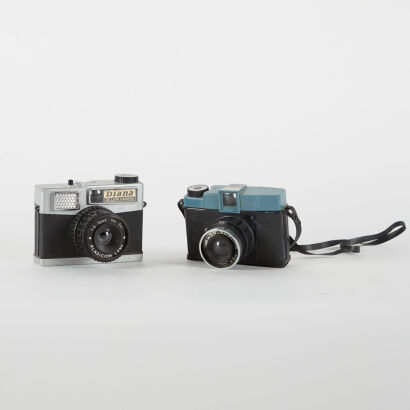 A Pair A Pair Of Vintage Film Instant Cameras