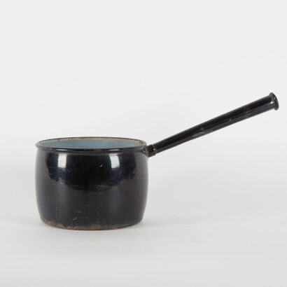 An Antique Black Enamel Long Handled Saucepan