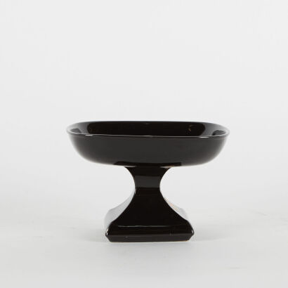 A Crown Lynn Flower Beauty Pedestal Vase In Black Gloss Glaze