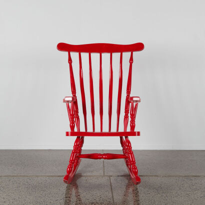 A Large Red Rocking Chair