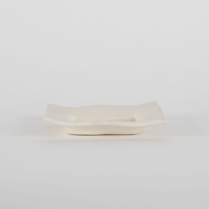 A Michelle Bow White Ceramic Tapa Flower Dish