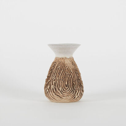 A Textured Clay And Glaze Vase