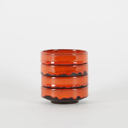 A Stack Of Four Mid Century Ceramic Lava Drip Glazed