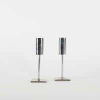 A Pair Of Mid Century Stainless Steel Candle Sticks