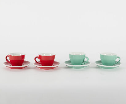 A Set Of Four Acme Coffee Cups And Saucers