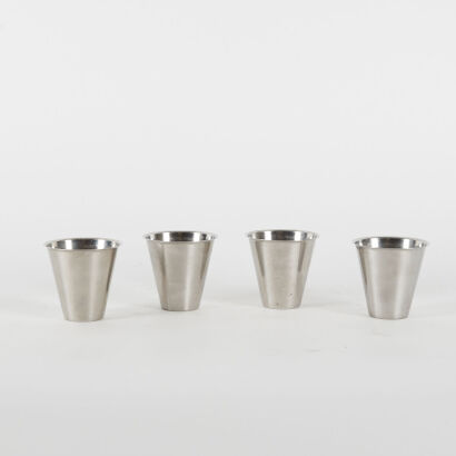 A Set Of Four Swedish Stainless Steel Camping Cups