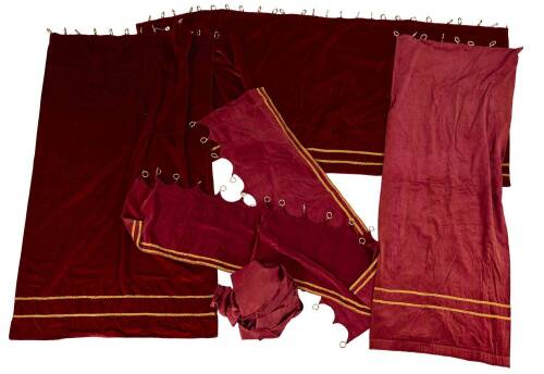 An Assortment of Various Red Velvet Magicians Show Booth Curtains