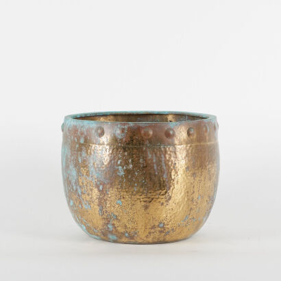 A Rustic Beaten Brass Planter