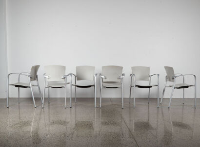 A Suit Of Six Enea Chairs