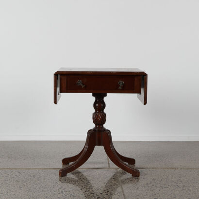 An Antique Hall Way Table With Dropsides