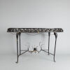 A Decorative Wrought Iron Table