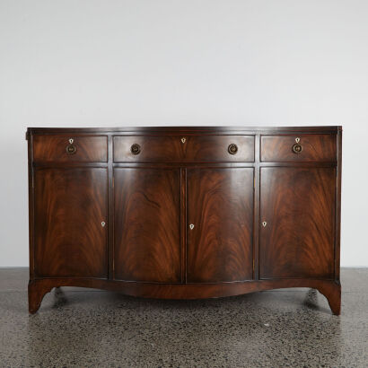 An Antique Bow-Front Sideboard