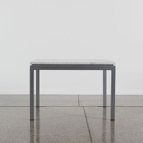 A Marble Topped Coffee Table With Stainless Legs By Bromhead Design